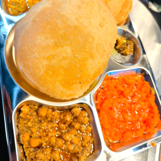 Halwa Puri Chanay Pickle & Aloo