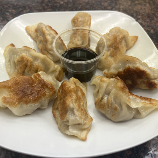 8. Pan-Fried Dumplings (12 pcs)