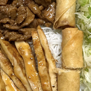48. Grilled Lemongrass Chicken, Charbroiled Pork, Spring Rolls (2 pcs)