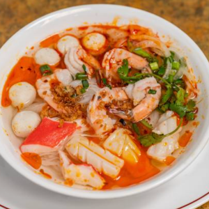 49. Hot and Sour Seafood with Rice Noodle (Spicy) - Pho Hai San Chua Cay