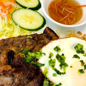 31. Grilled Pork Chop, Shredded Pork Skin, & Fried Egg on Rice / Com Suon Bi Trung