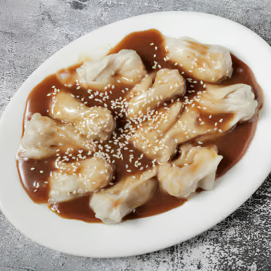 Raviolis hunan avec sauce aux arachides (porc) (10 mcx) / Hunan Dumplings with Peanut Sauce (Pork) (10 pcs)