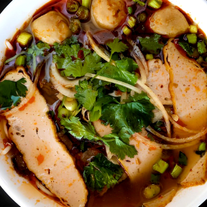 19. Spicy Hue Beef Noodle Soup with Well-Done Flank, Vietnamese Ham, Meat Balls (with Pho Noodle)