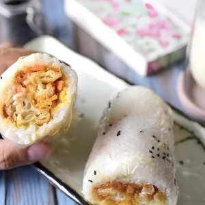 Glutinous Rice Rolled with Egg Pork Floss and Fried Dough Sticks 上海糍饭团