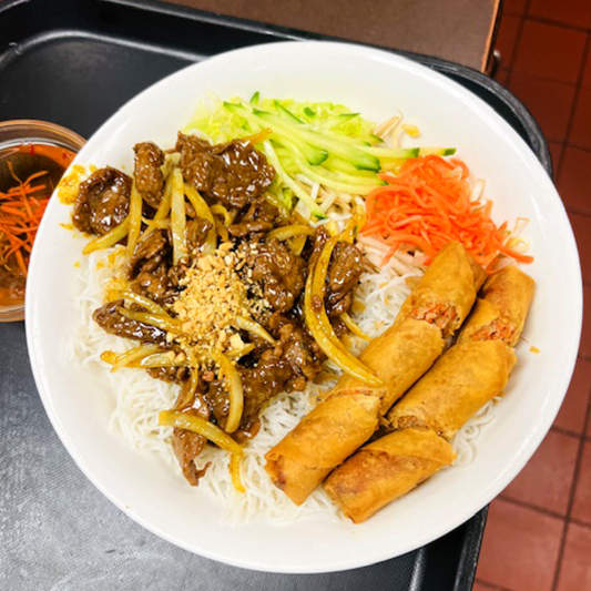 19. Stir-Fried Lemongrass Beef & Spring Rolls on Rice Vermicelli