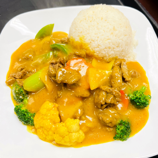 46. Stir-Fried Curry Beef with Vegetables on Steamed Rice