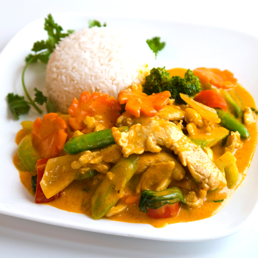 48. Stir-Fried Curry Chicken Breast with Vegetables on Steamed Rice
