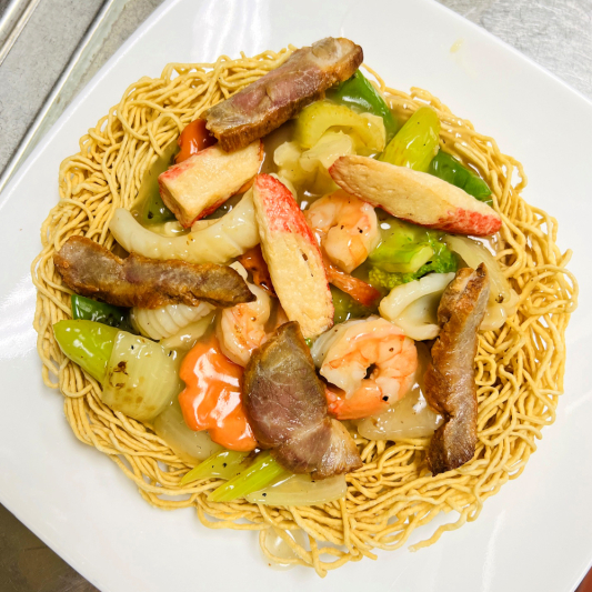 58. Stir-Fried Special with Vegetables on Crispy Egg Noodles