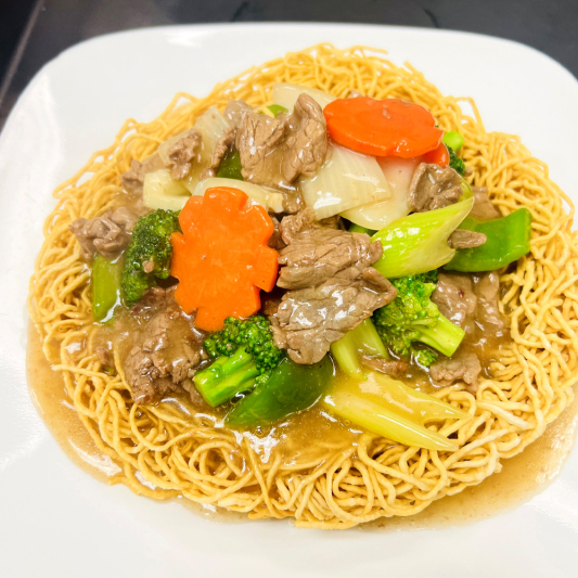 59. Stir-Fried Beef with Vegetables on Crispy Egg Noodles
