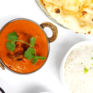 Vegetarian Curry with Rice, Naan, and Pop