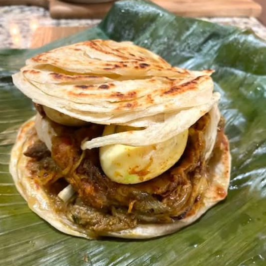 Egg Kizhi Parotta (2 pcs)