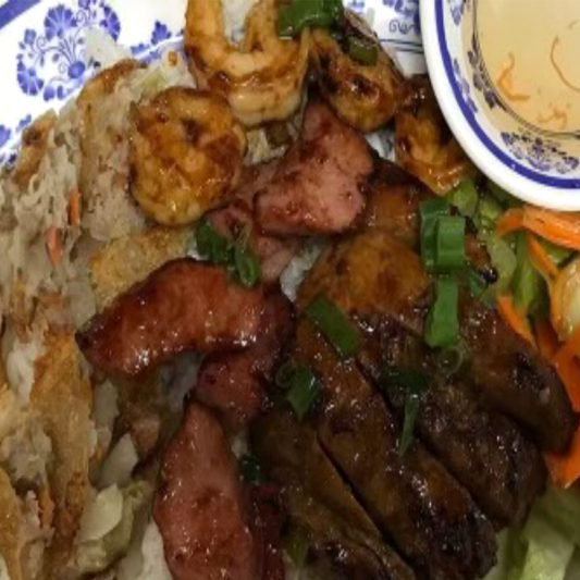 46. Lemongrass Pork Chop, BBQ Pork, Shrimp (4 pcs) and Spring Roll on Rice / Cơm Sườn, Nem Nướng, T&ocirc;m V&agrave; Chả Gi&ograve;