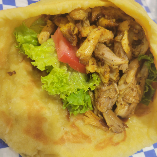 Freshly Rolled Roti with Curried Chicken