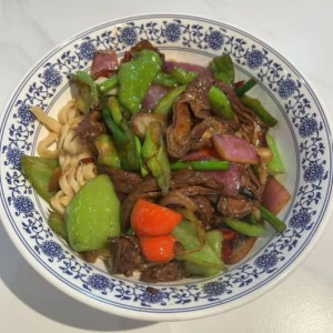 Stir-Fried Pork Intestines with Hot Peppers 尖椒肥肠盖码面 