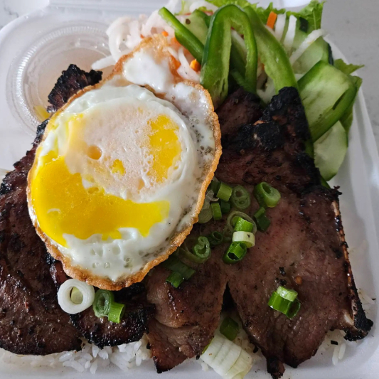 45. Grilled Pork Chop with Fried Egg over Rice (Cơm Sườn Trứng Ốp La)