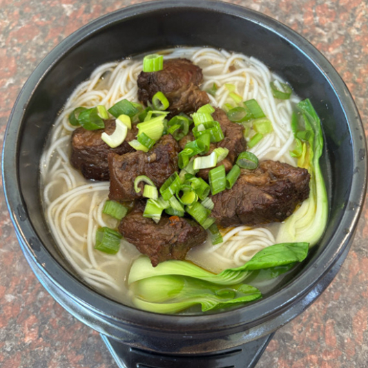 A10. Special Clay Pot Rice Noodles with Beef 砂锅牛肉米线