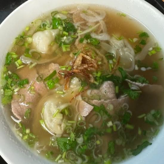 E6. Egg Noodle Soup with Wontons and Beef