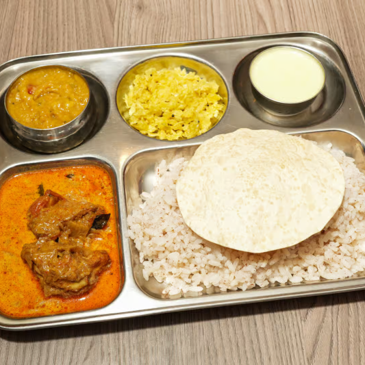 Rice, Chicken Curry, Sambar, Moru Curry, Thoran, Pickles, & Pappadam