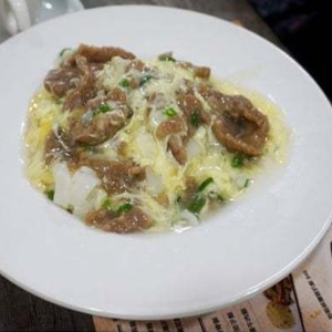 Fried Rice Noodles with Scrambled Egg and Beef