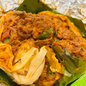 Chicken Kizhi Porotta