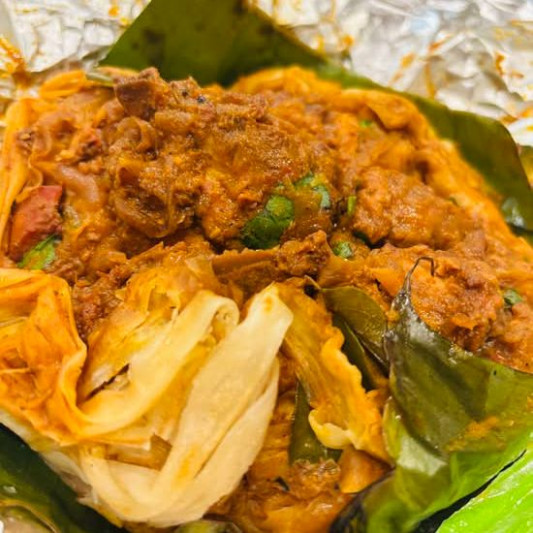 Chicken Kizhi Porotta