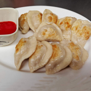 12. Pork Dumplings (10 pcs)