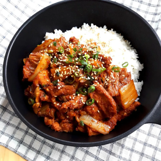 M20. Spicy Stir-Fried Pork over Rice - 제육덮밥
