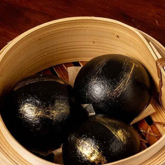 51. Steamed Bamboo Charcoal Bun with Egg Yolk Stuff