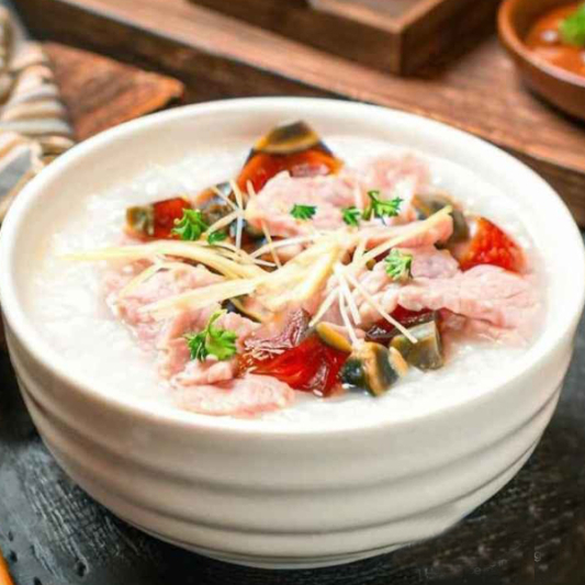 44. Shredded Meat with Preserved Egg Congee