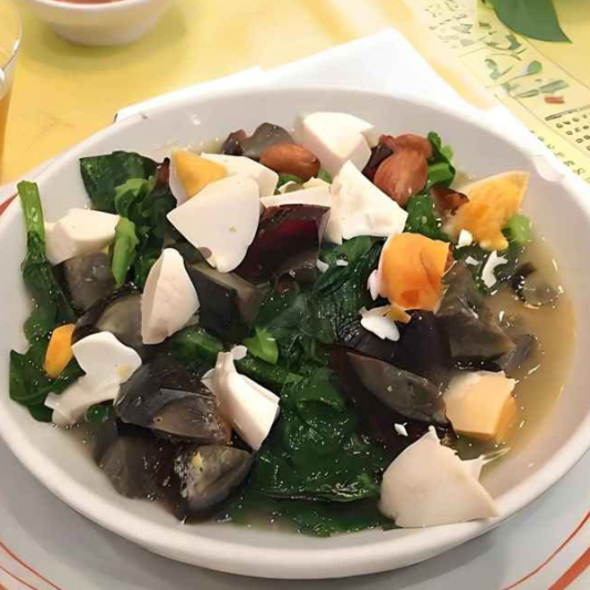 66. Preserved Egg with Snowpea Leaves in Broth 上湯鹹蛋浸豆苗