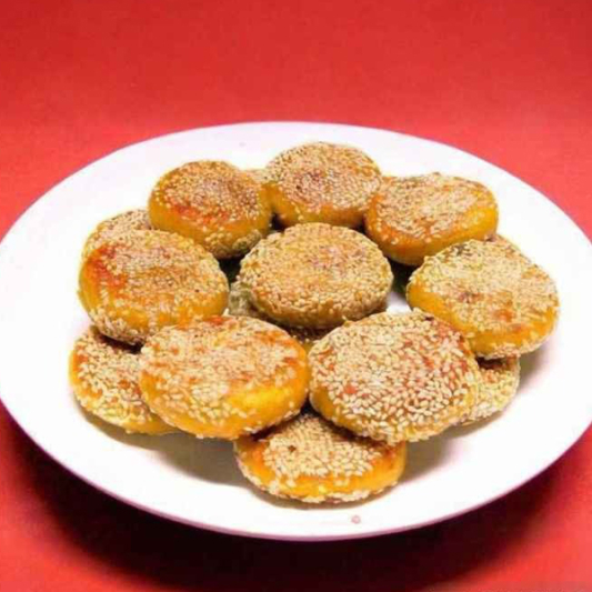 52. Deep Fried Egg Yolk Dumpling with Molten Sesame