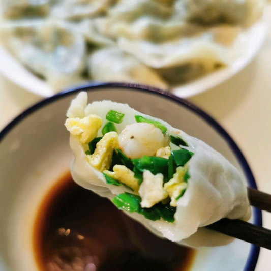 77D. Pork Dumplings with Chives & Eggs (12 pcs) 饺子-猪肉三鲜（韭菜/鸡蛋/虾皮)