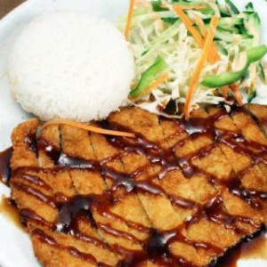 Fried Pork Tenderloin with Sauce on Top