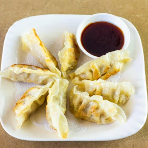 13. Grilled Pork Dumplings (8 pcs)