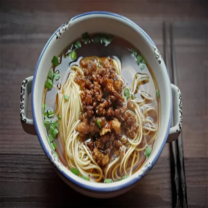 Homemade Noodles Mixed with Minced Meat Sauce in Soup