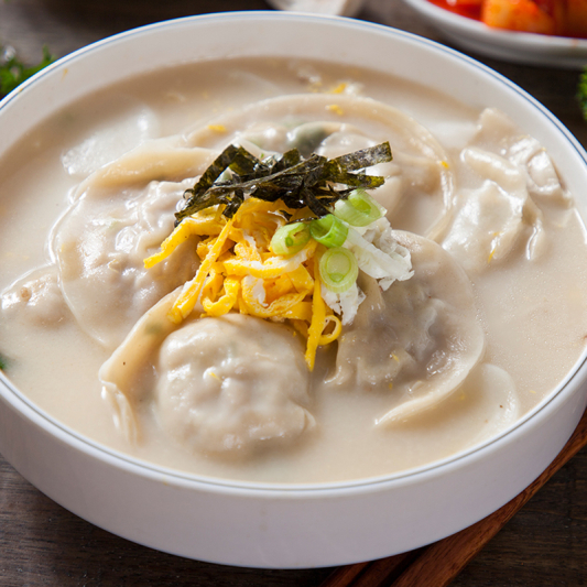 3. Dumpling & Rice Cake Soup (Theok Mandu Soup)