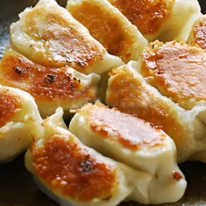 2. Pan-Fried Pork Dumplins (5 pcs) / 鲜肉锅贴