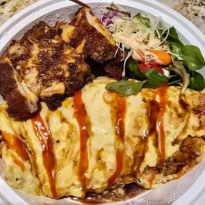 100. Omelet Rice with Pork Cutlet