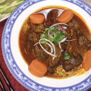 H6. Beef Stew with Bread and Noodles 