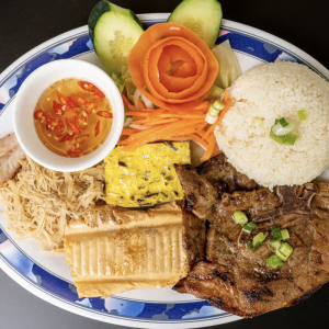 C21. Grilled Pork Chop, Shredded Pork Skin, Egg Cake, Fried Shrimp Cake