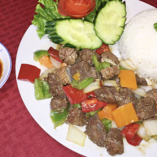 C26. Sizzling Cube Steak Filet Mignon with Rice