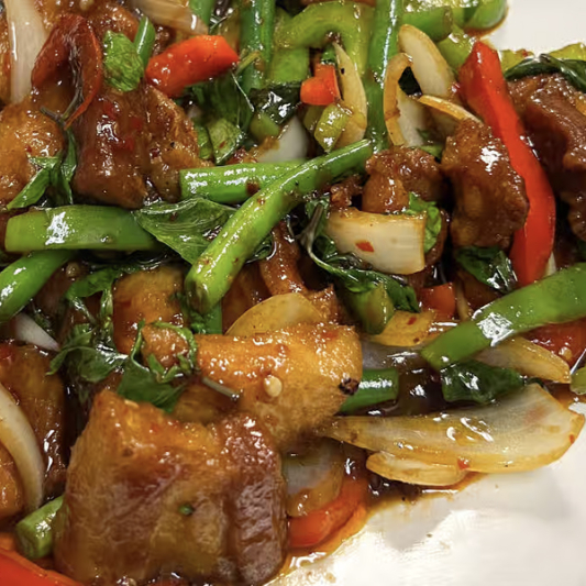 A. Pad Kra Pow Pork Belly with Rice