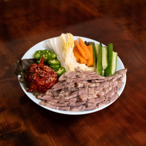 Sliced Pork with Veggies and Spicy Sauce (족발무침)