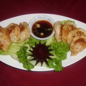 8. Pan-Fried Dumplings with Chicken and Cabbage (6 pcs)