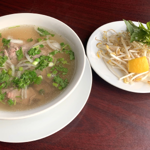 26. Thinly Sliced Medium Rare Beef Soup