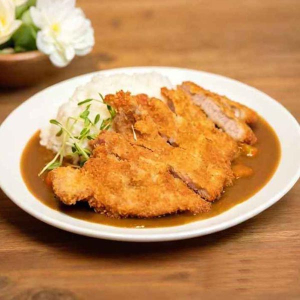 O09. Pork Chop with Mushrooms on Rice 蘑菇猪扒饭