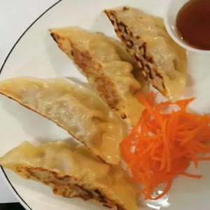 11. B&ograve; Dumplings (4 pcs)