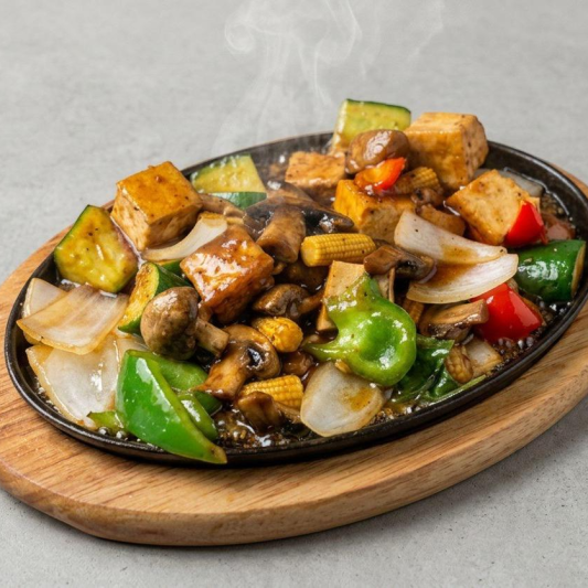 56. Sizzling Tofu with Veggies & Rice / Cơm Chay L&uacute;c Lắc
