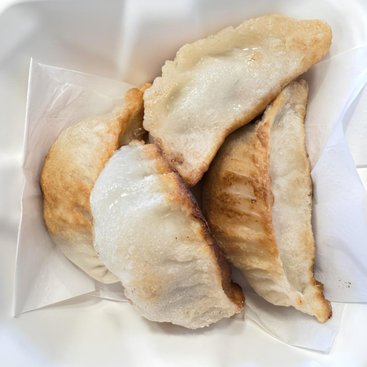 15. Pan Fried Pork Dumpling (4 pcs)