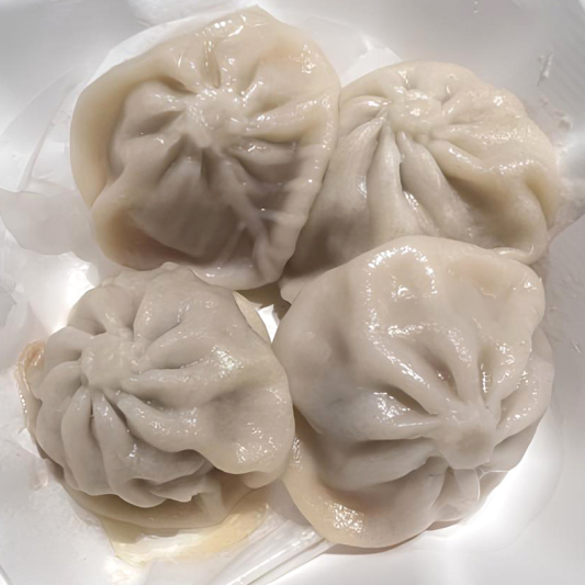 11. Steamed Juice Pork Bun (4 pcs)